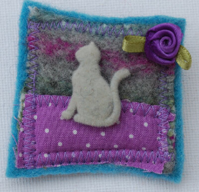 Cat brooch.