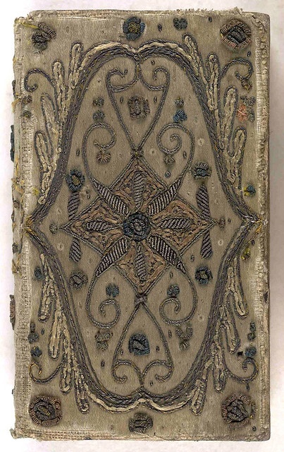 17th century embroidered satin book cover with silver threads