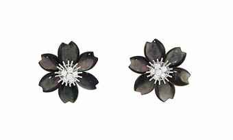 PROPERTY OF A LADY OF TITLE: A PAIR OF 'ROSE DE NOEL' MOTHER-OF-PEARL AND DIAMOND EAR CLIPS, BY VAN CLEEF &amp;amp; ARPELS. Each modelled as a single flowerhead, with brilliant-cut diamond cluster cen…