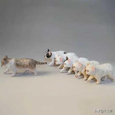 日本木雕作者Masato Watanabe 的一些新作品，都是神态各异，生动形象的各种木雕猫猫狗狗。