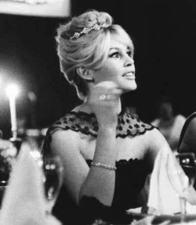 Brigitte Bardot at the premiere of En cas de malheur (Love Is My Profession), Paris, 21 January 1958.