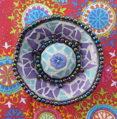 3D的效果，很漂亮~<br /><a class='shortlnk' href='/s/035ff995f' target='_blank' title='http://www.etsy.com/listing/71112501/3d-mosaic-flower-purple-and-turquoise?ref=v1_other_1'>http://duitang.com/s/0…
