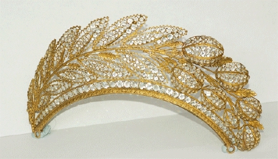 French tiara, c. 1820, is set in a patterned, gilded frame with faceted crystals. It depicts a spray of hyacinth leaves with raised flower buds