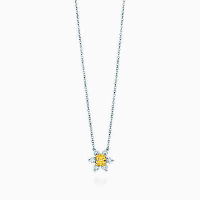 18K 黄金加铂金镶蒂芙尼黄钻金凤花吊坠。