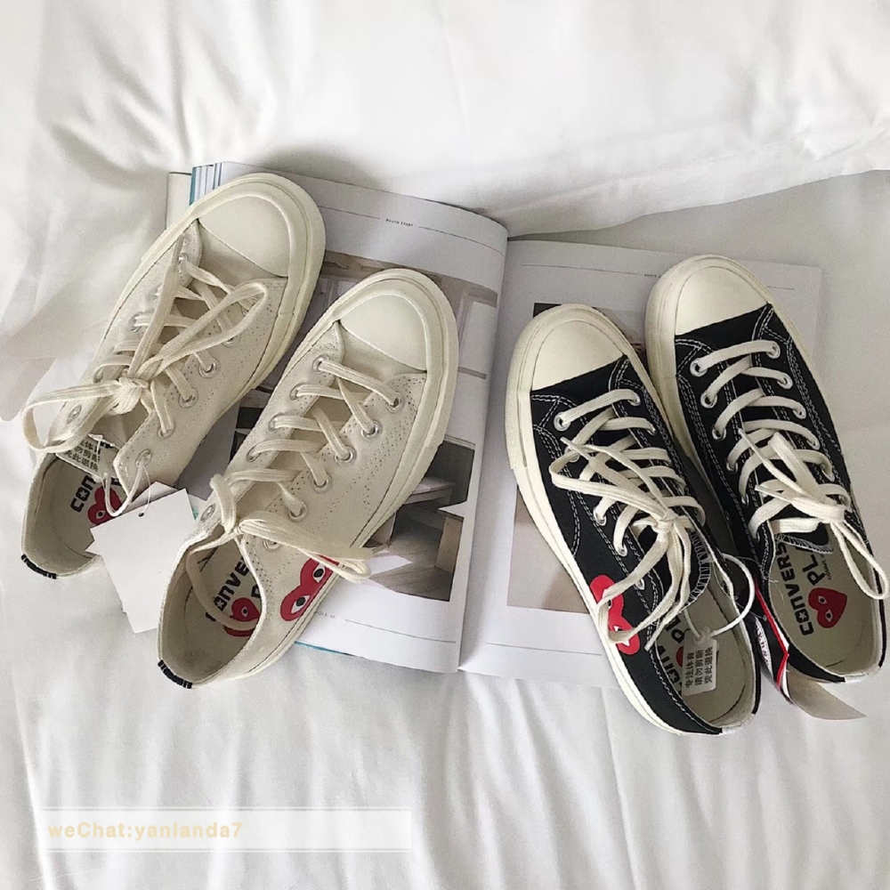 Converse X Play匡威与川久保龄合作款帐布鞋，鞋子是帆布面，手感比普通匡威的帆布鞋厚一点点，图案印制也不含糊，清晰饱满，最关键是可以增高，这款跟普通的帆布鞋底不同,运用了加厚的避震鞋垫，加.上vibram防滑鞋底,走多久的路都不累!轻松自如! 整体造工非常精致，